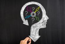 Thoughts and options head with arrows on blackboard